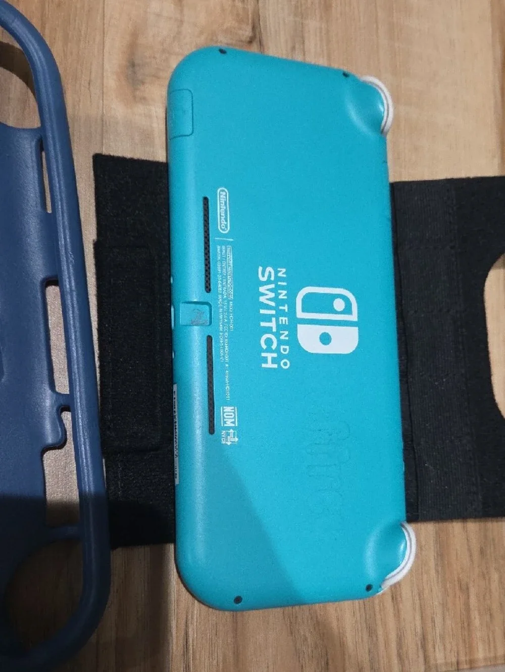 Nintendo Switch Lite Turquoise with Zelda Carry Case and Game Bundle